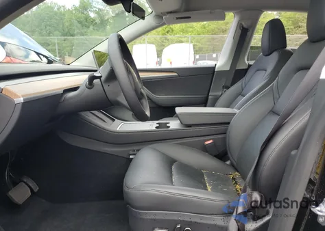 2025 Tesla Model Y из США, поврежденный, VIN 7SAYGDED3SA372244